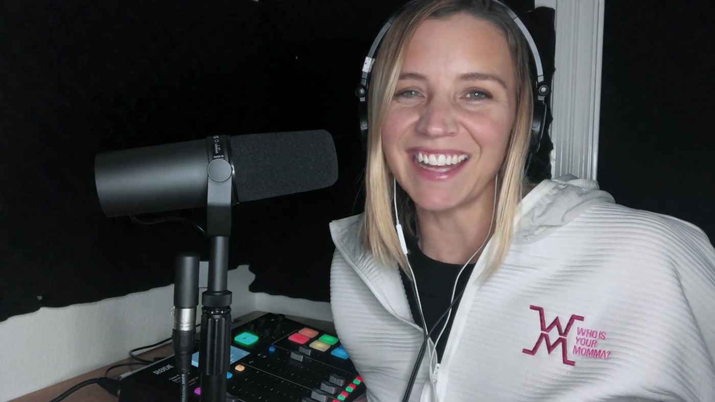 Frame from BYLR Radio production showing a host recording at a studio microphone